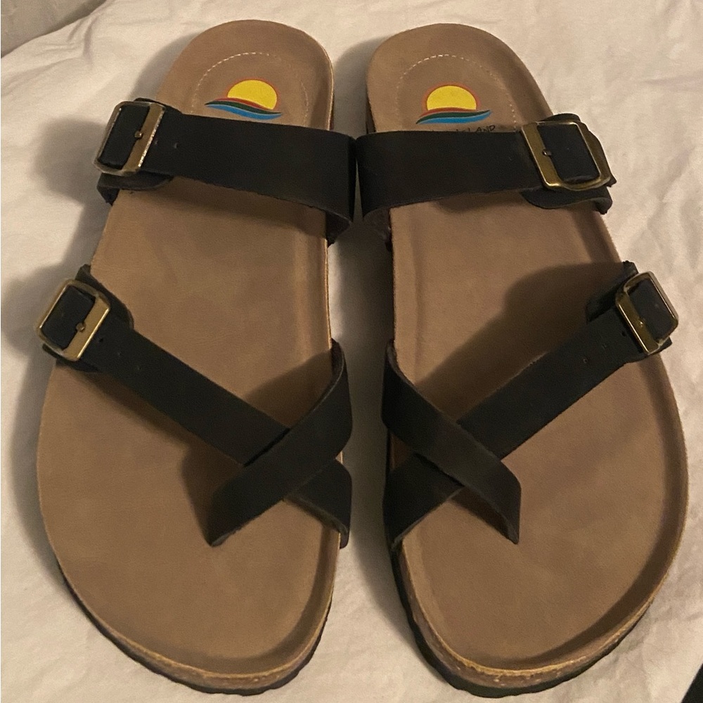 Strappy cork bottom sandals.